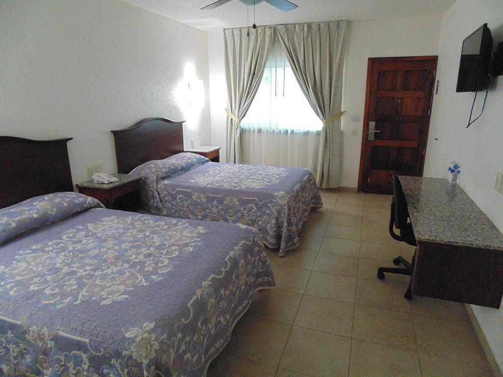 סיודד גוזמן Hotel Hacienda מראה חיצוני תמונה